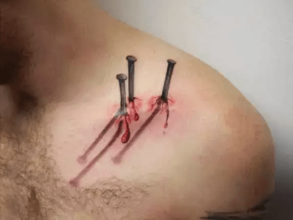 The Latest Trendy Collarbone Tattoos for Men 2024 23 Nail Tattoo On Collarbone-16