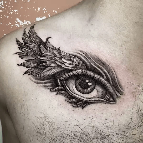 The Latest Trendy Collarbone Tattoos for Men 2024 19 Winged Eye collarbone tattoos