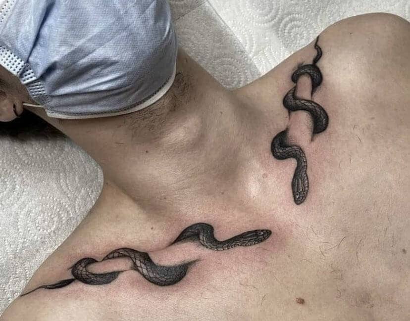 The Latest Trendy Collarbone Tattoos for Men 2024 8 snake collar bone tattoos-1